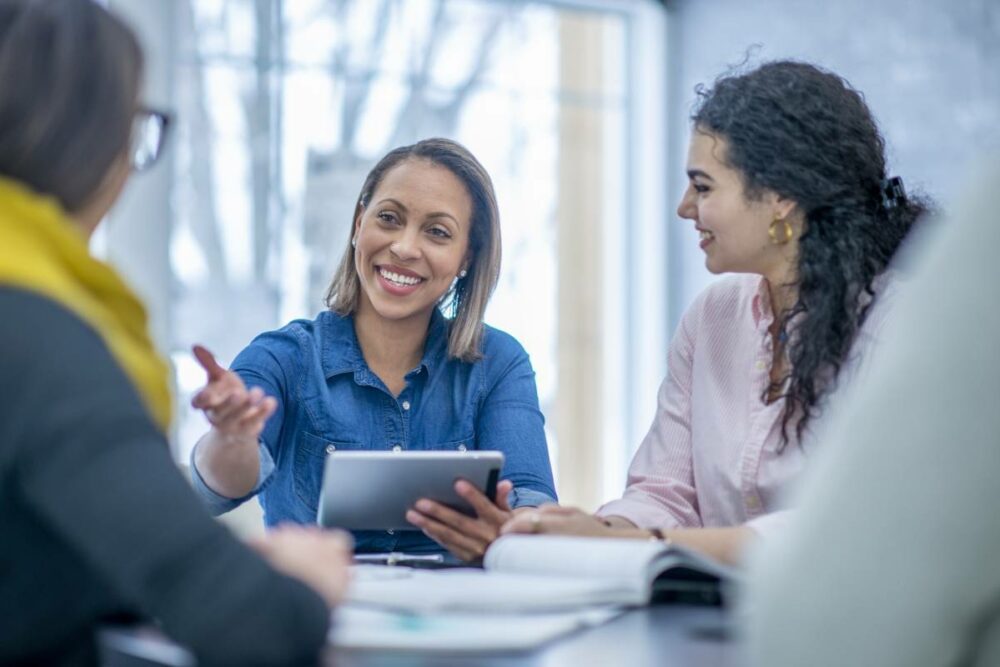 /three-women-having-business-meeting.jpg